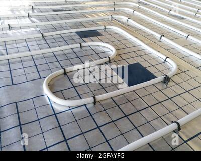 Plumbing pipe for water supply and underfloor heating in the new house under construction Stock Photo