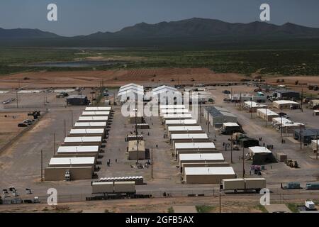 Area photo of the progression of Dona Ana Housing Area near Fort Bliss, Texas, on Aug. 22, 2021. The Department of Defense, in support of the Department of State, is providing transportation and temporary housing in support of Operation Allies Refuge. This initiative follows through on America's commitment to Afghan citizens who have helped the United States, and provides them essential support at secure locations outside Afghanistan. (U.S. Army photo by Spc. Elijah Ingram) Stock Photo