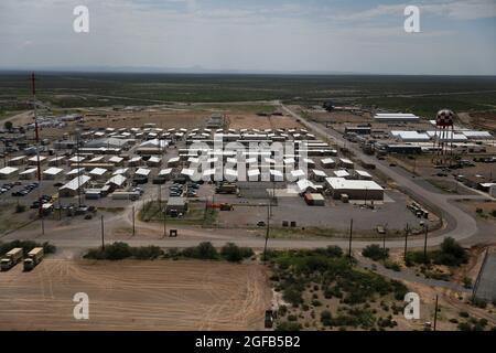 Area photo of the progression of Dona Ana Housing Area near Fort Bliss, Texas, Aug. 22, 2021. The Department of Defense, in support of the Department of State, is providing transportation and temporary housing in support of Operation Allies Refuge. This initiative follows through on America's commitment to Afghan citizens who have helped the United States, and provides them essential support at secure locations outside Afghanistan. (U.S. Army photo by Spc. Elijah Ingram) Stock Photo