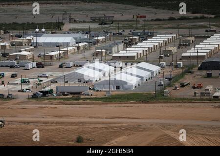 Area photo of the progression of Dona Ana Housing Area near Fort Bliss, Texas, Aug. 22, 2021. The Department of Defense, in support of the Department of State, is providing transportation and temporary housing in support of Operation Allies Refuge. This initiative follows through on America's commitment to Afghan citizens who have helped the United States, and provides them essential support at secure locations outside Afghanistan. (U.S. Army photo by Spc. Elijah Ingram) Stock Photo