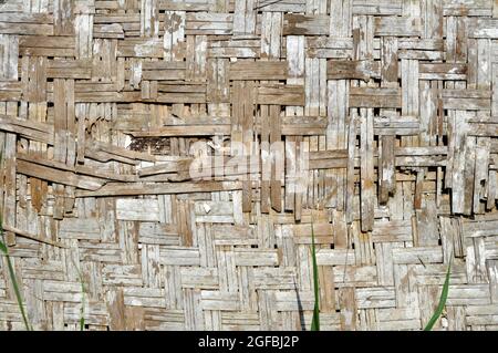 Old woven bamboo wall background texture Stock Photo
