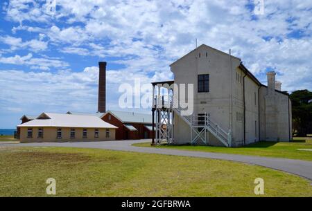 Wooden hospital building and boiler steam plant with brick chimney at historic Quarantine Station museum site near Portsea on the Mornington Peninsula Stock Photo