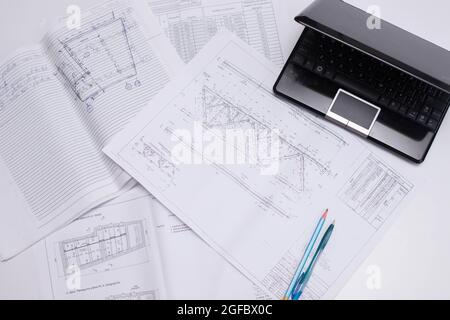 drawings of a construction engineer on a sheet of paper Stock Photo