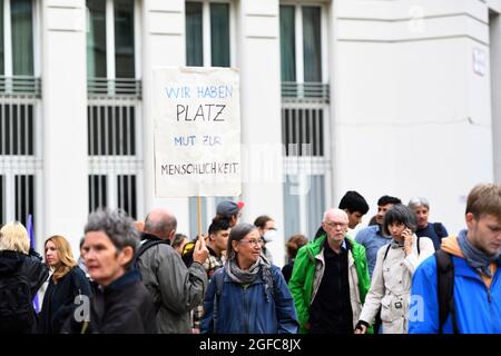 Vienna, Austria. 24th August, 2021. Demonstration human rights are non-negotiable, in solidarity with the people of Afghanistan. The demonstration takes place in front of the Ministry of the Interior on Minoritenplatz. Poster with the inscription 'We have space courage to be human'. Stock Photo