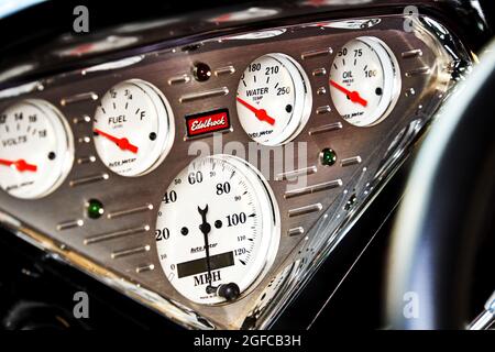 Edelbrock instrumentation in a vehicle of the American brand chevrolet, round instruments with analog display in Lehnin, Germany, August 21, 2021 Stock Photo