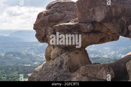 Sandy rocks with grottos.Natural outdoor background. Copy space. Stock Photo