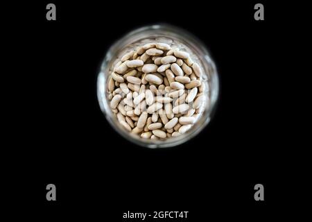 Closeup of white beans in a jar Stock Photo