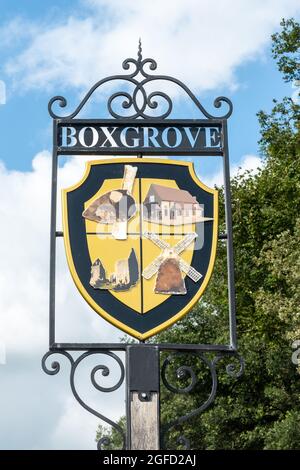 Boxgrove Village sign with pictures of landmarks in the village, West Sussex, England, UK Stock Photo