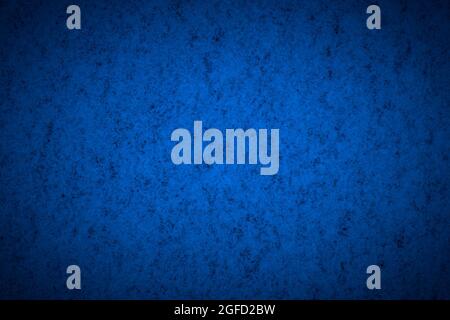 Blue structured background with vignetting, darkening around the edges of the photo. Stock Photo