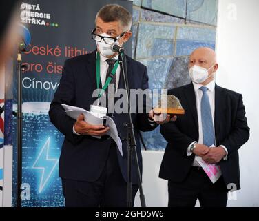 Cizkovice, Czech Republic. 25th Aug, 2021. From left to right Prime Minister Andrej Babis and CEZ CEO Daniel Benes attend a briefing during visit of CirkTech research centre, on August 25, 2021, in Cizkovice, Czech Republic. The centre is operated by Prague's University and company Lafarge Cement, both of which are involved in survey regarding future processing of Czech lithium that is to be mined at Cinovec by CEZ's unit Geomet. Babis shows the rock from which lithium is obtained. Credit: Libor Zavoral/CTK Photo/Alamy Live News Stock Photo