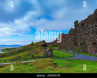 Tourists and visitors enjoy the stunning landscape view on the route from the driving tour of iceland during Summer period. Iceland, Europe. Stock Photo