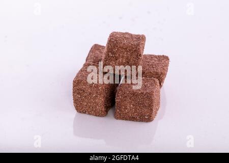 May 25, 2021, Gaziantep, Anatolia peninsula, Turkey: Pistachio, cocoa, and sesame coated special Turkish delight produced in a workshop in the Turkish town of Gaziantep. Turkish delight or lokum is a sweet Turkish delicacy which comes in many varieties and combinations (Credit Image: © Muhammad Ata/IMAGESLIVE via ZUMA Press Wire) Stock Photo