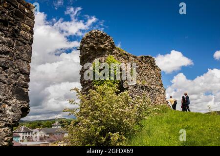 UK, Wales, Carmarthenshire, Llandovery, Castle, visitors in ruins Stock Photo