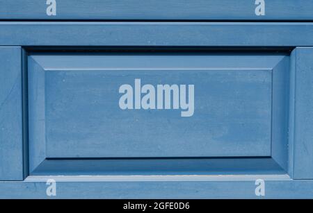Closeup of the wooden blue door in France, useful as a background Stock Photo