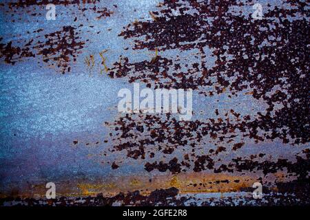 Dark blue and black spotted rust background Stock Photo