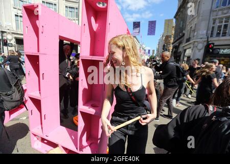 London, England, UK. 25th Aug, 2021. Climate change campaign group Extinction Rebellion activists occupy London's Oxford Circus in the third day of two weeks of planned action. (Credit Image: © Tayfun Salci/ZUMA Press Wire) Stock Photo