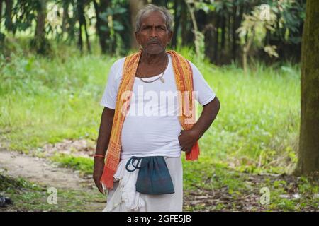 old man poor farmer in village Stock Photo