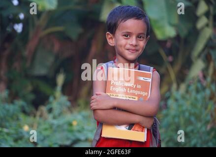 A student kid with books - child education concept Stock Photo