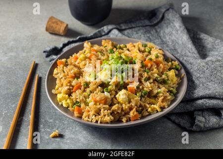 Homemade Chinese Fried Rice with Eggs Carrots and Peas Stock Photo