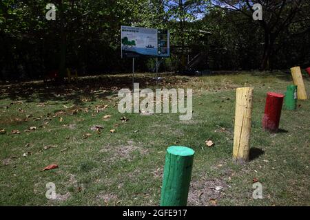 Southern Grenada Mangroves at  Woburn Bay Marine Protected Area Billboard 'Help Protect our Mangroves' and Protection Posts for Grass in Rastafarian C Stock Photo