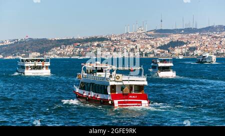 Istanbul, Turkey - 1 April, 2017: Passenger ships crossing Bosporus at spring day Stock Photo