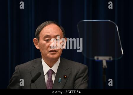 Tokyo, Japan. 25th Aug, 2021. Japan's Prime Minister Yoshihide Suga speaks during a news conference at the prime minister's office in Tokyo. (Credit Image: © POOL via ZUMA Press Wire) Credit: ZUMA Press, Inc./Alamy Live News
