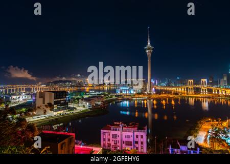 View of Macau Tower Convention and Entertainment Center at night, Macao Stock Photo