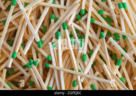 Large Pile of Green Matches Background Texture. Stock Photo
