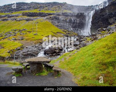 Waterfall Fossa (Fossá) during strong wind in rainy weather, Streymoy Island, Faroe Islands, Denmark - Gasadalur Mulafossur Waterfall Stock Photo