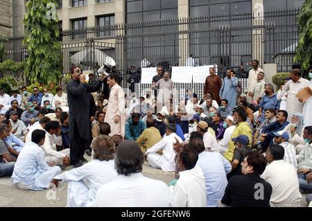 Terminated Employees of Sui Southern Gas Company (SSGC) are holding protest demonstration against administration, outside SSGC Office in Karachi on Wednesday, August 25, 2021. Stock Photo