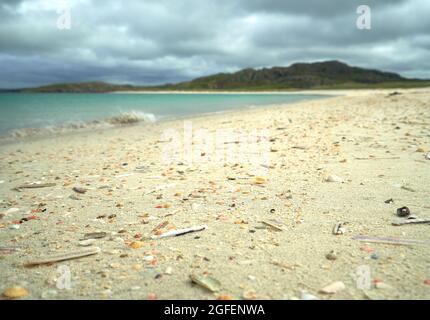 The shell beach at Reef in the Isle of Lewis with the tide line strewn with colourful shells. Stock Photo