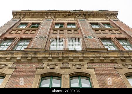 Low angle view of Traditional brick house in England isolated on white background. Stock Photo