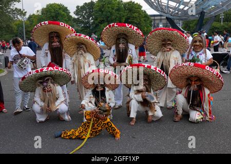 Mexican folk dancers at the Unisphere in Flushing Meadows Corona park Queens NYC