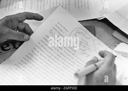 Austin Texas USA, circa 1991: Texas high school teacher editing student writing, ©Bob Daemmrich Stock Photo