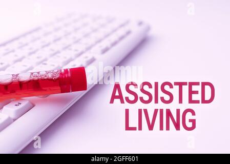 Text caption presenting Assisted Living. Business showcase longterm care facility for elderly or disabled showing Typing Medical Notes Scientific Stock Photo