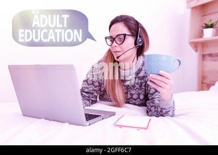 Text sign showing Adult Education. Word for educational programs for adults who are out of school Writer Creating New Novel, Professor Checking Stock Photo