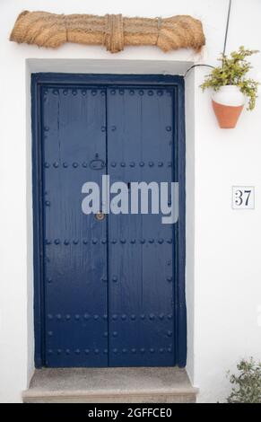 Door straw curtain, Frigiliana, Province of Malaga, Andalucia, Spain.   Frigiliana is a small town near Nerja but in the mountains and known as one of Stock Photo