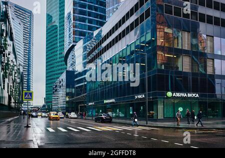 Streets of the Moscow City Business Center on a rainy day, metropolitan life: Moscow, Russia - April 21, 2021 Stock Photo
