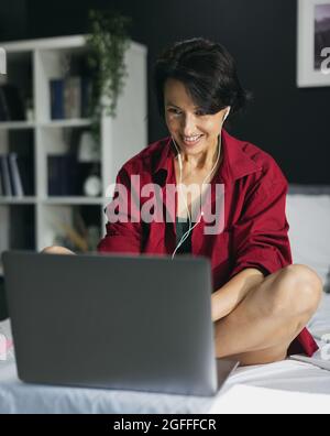 Woman with laptop for studying Stock Photo