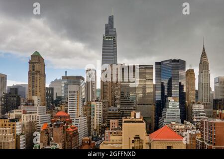 Gray thunderhead clouds look threatening over Midtown Manhattan, NYC, USA Stock Photo