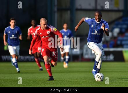 OLDHAM, UK. AUGUST 24TH  Oldham Athletic's Dylan Bahamboula tussles with David Morgan of Accrington Stanley during the Carabao Cup match between Oldham Athletic and Accrington Stanley at Boundary Park, Oldham on Tuesday 24th August 2021. (Credit: Eddie Garvey | MI News) Stock Photo