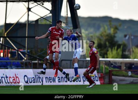 OLDHAM, UK. AUGUST 24TH  Oldham Athletic's Carl Piergianni tussles with Ross Sykes of Accrington Stanley during the Carabao Cup match between Oldham Athletic and Accrington Stanley at Boundary Park, Oldham on Tuesday 24th August 2021. (Credit: Eddie Garvey | MI News) Stock Photo