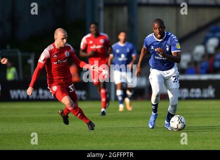OLDHAM, UK. AUGUST 24TH  Oldham Athletic's Dylan Bahamboula tussles with David Morgan of Accrington Stanley during the Carabao Cup match between Oldham Athletic and Accrington Stanley at Boundary Park, Oldham on Tuesday 24th August 2021. (Credit: Eddie Garvey | MI News) Stock Photo