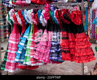 Flamenco Dresses on Sale, Nerja, Costa del Sol, Province of Malaga, Andalucia, Spain Stock Photo