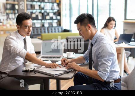 Confident businessmen having a meeting Stock Photo