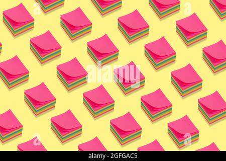 Colorful sticky notes pattern on a  yellow background. Creative minimal isometric concept. Back to school background. Stock Photo