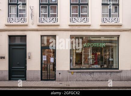 Brugge, Flanders, Belgium - August 3, 2021: Facade of Pharmacy Latruwe Christine in Braambergstraat has sober window display. Stock Photo