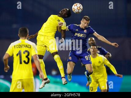 (210826) -- ZAGREB, Aug. 26, 2021 (Xinhua) -- Adama Traore (2nd L) of FC Sheriff gets up for a header during the UEFA Champions League play-off second leg match between Dinamo Zagreb and FC Sheriff at the Maksimir Stadium in Zagreb, Croatia on Aug. 25, 2021. (Slavko Midzor/Pixsell via Xinhua) Stock Photo