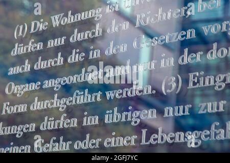German Basic Law Article 13,Inviolability of the home (Unverletzlichkeit der Wohnung) , photographed on the glass panes at Jakob-Kaiser-Haus in Berlin Stock Photo
