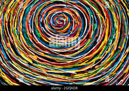 Background composed of a spiral of strips of various colors Stock Photo
